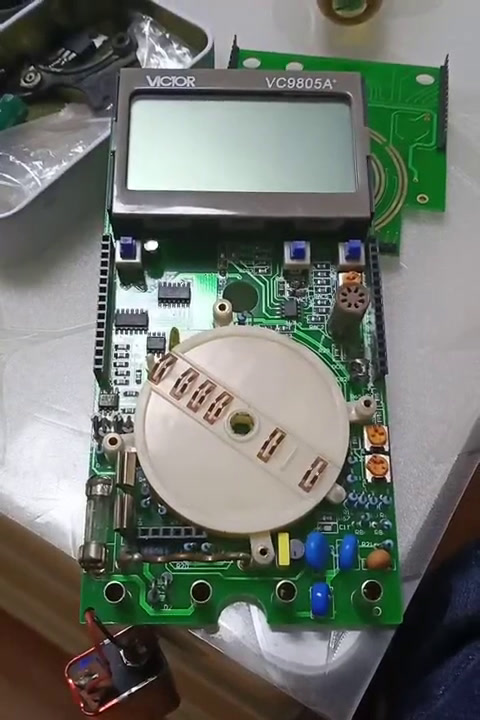 请帮忙,火急,哪位有胜利vc9805a 万用表的档位盘的簧片位置图?